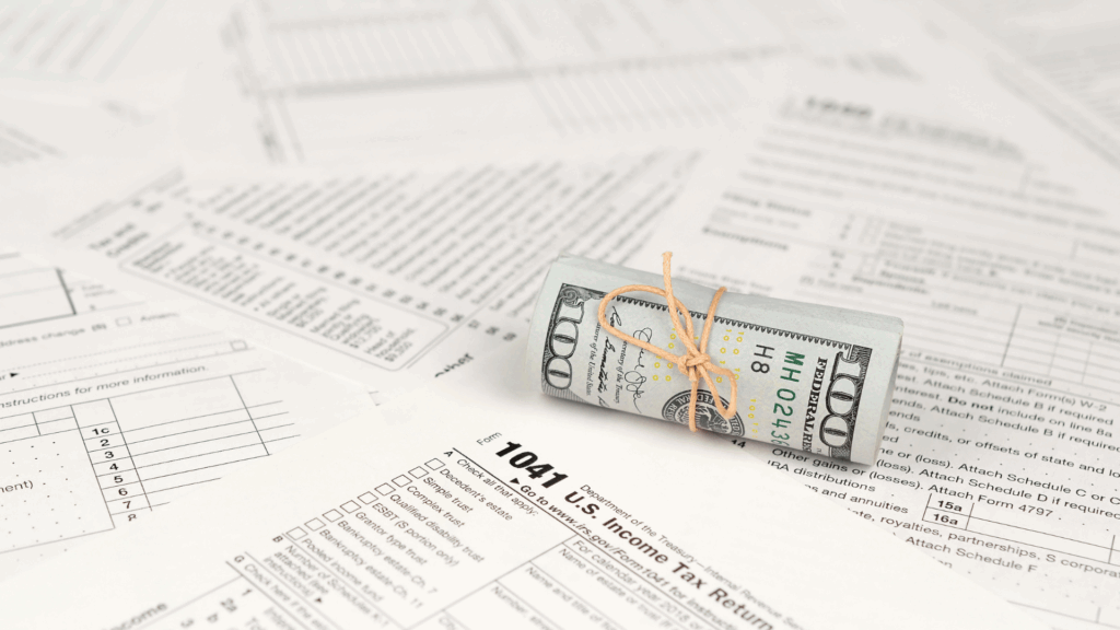 Professional CPA reviewing trust tax documents with a client