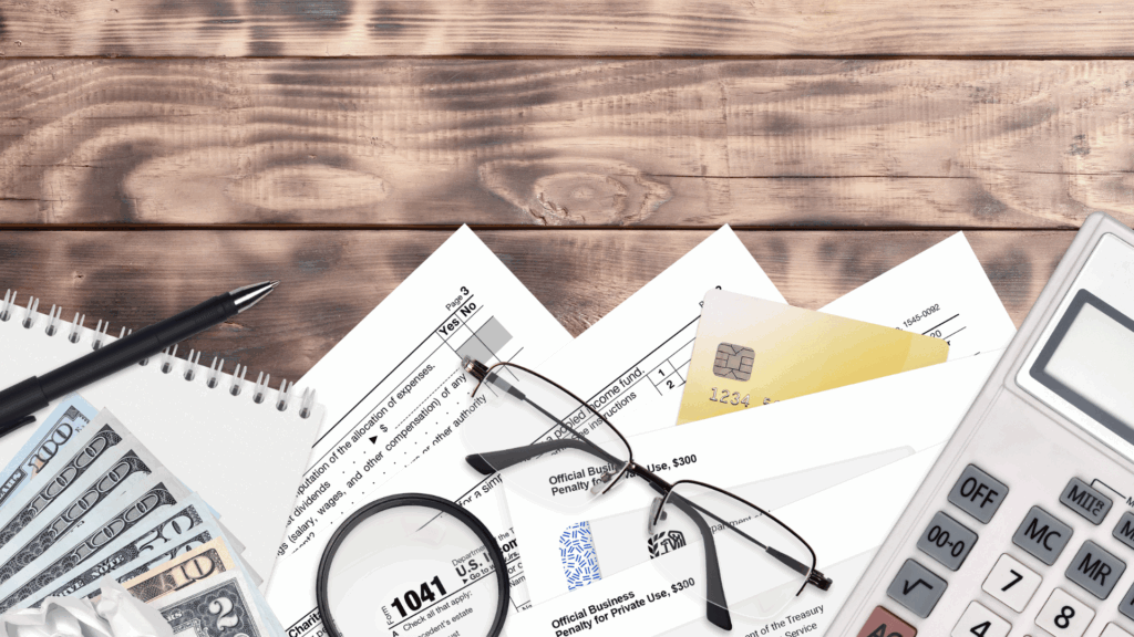 Detailed estate planning paperwork on a desk with legal and financial charts