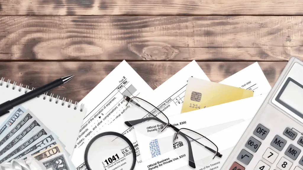 Detailed estate planning paperwork on a desk with legal and financial charts