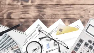 Detailed estate planning paperwork on a desk with legal and financial charts