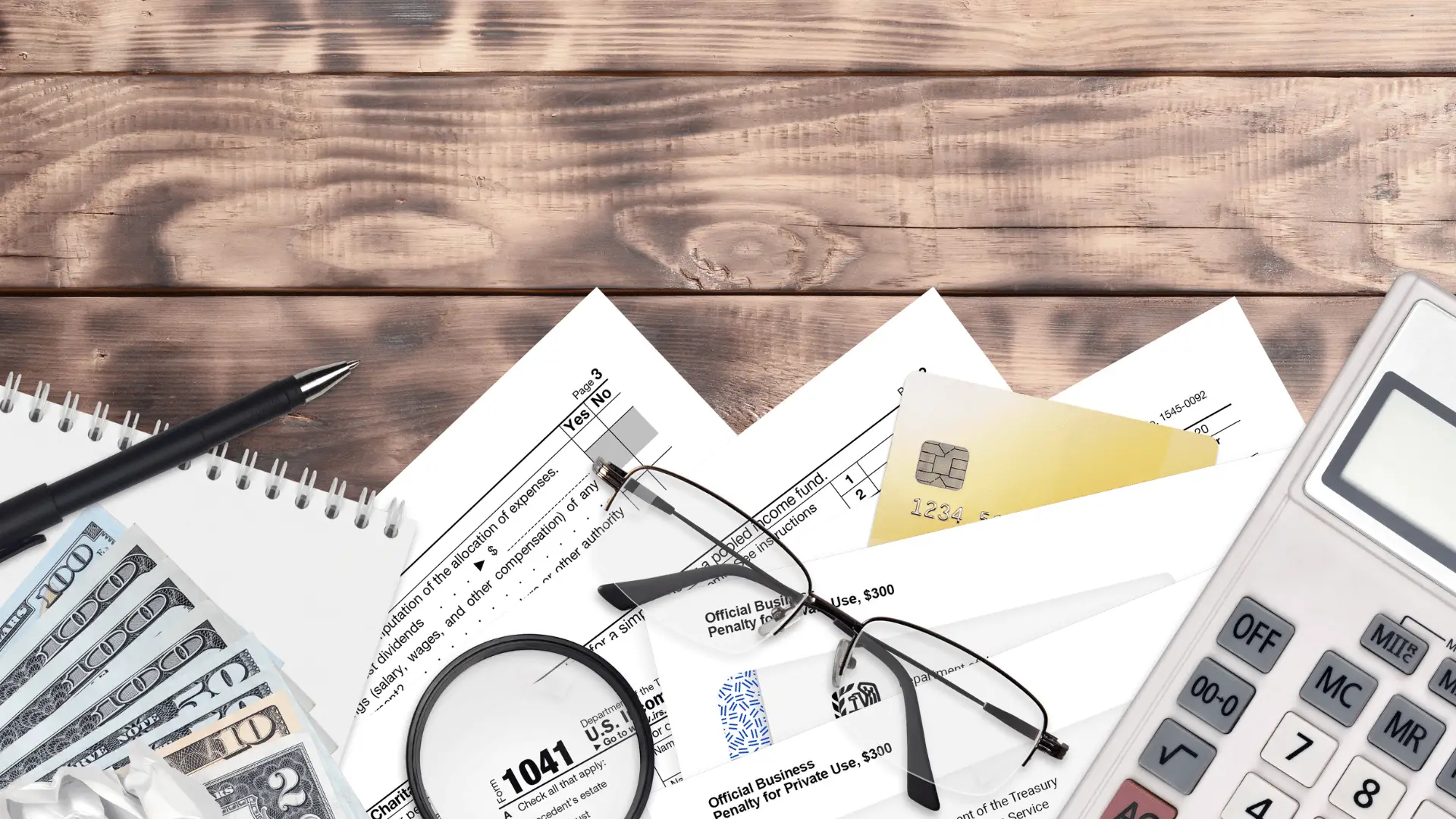 Detailed estate planning paperwork on a desk with legal and financial charts